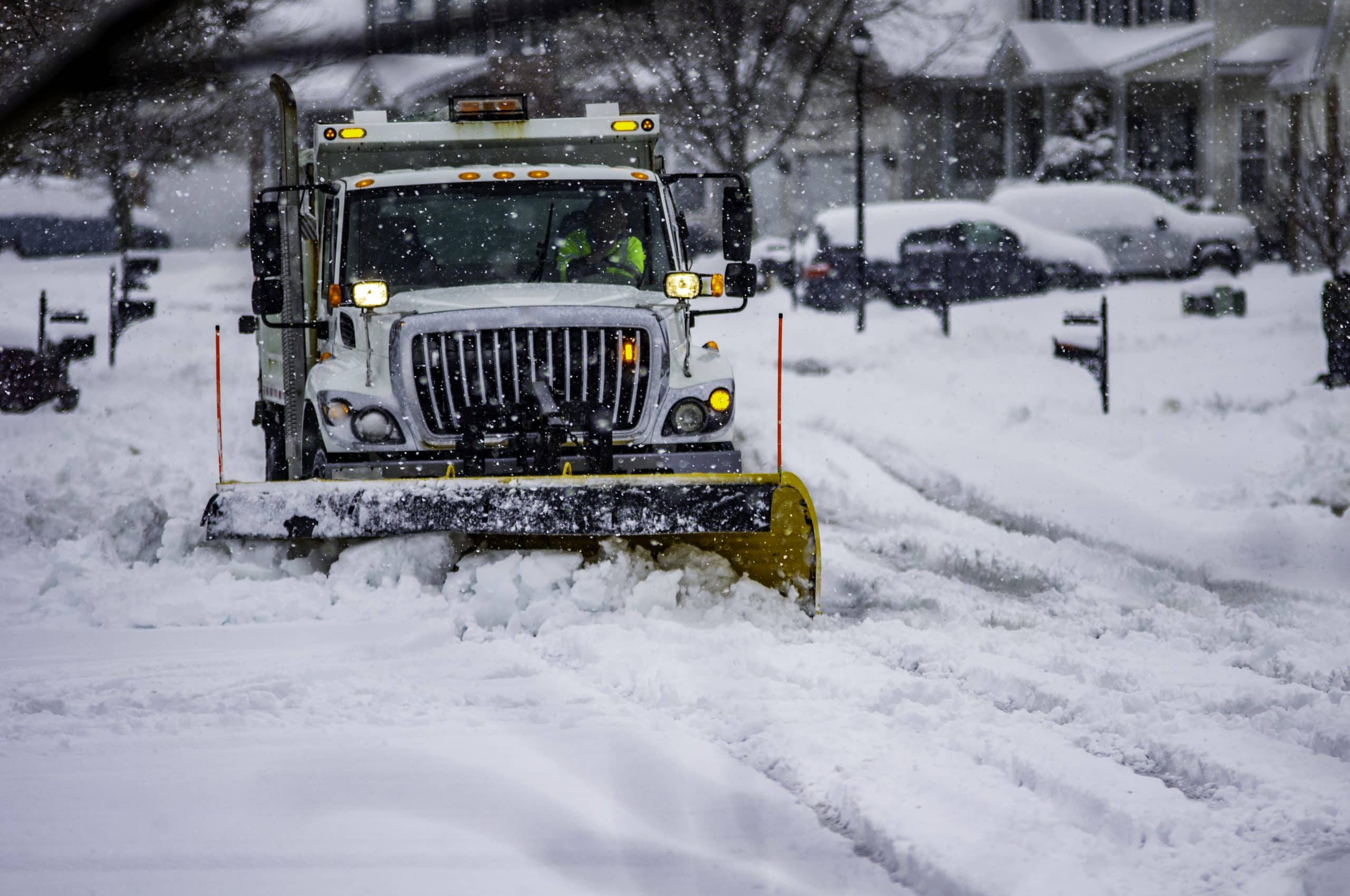 snowplow clearing streets of snow