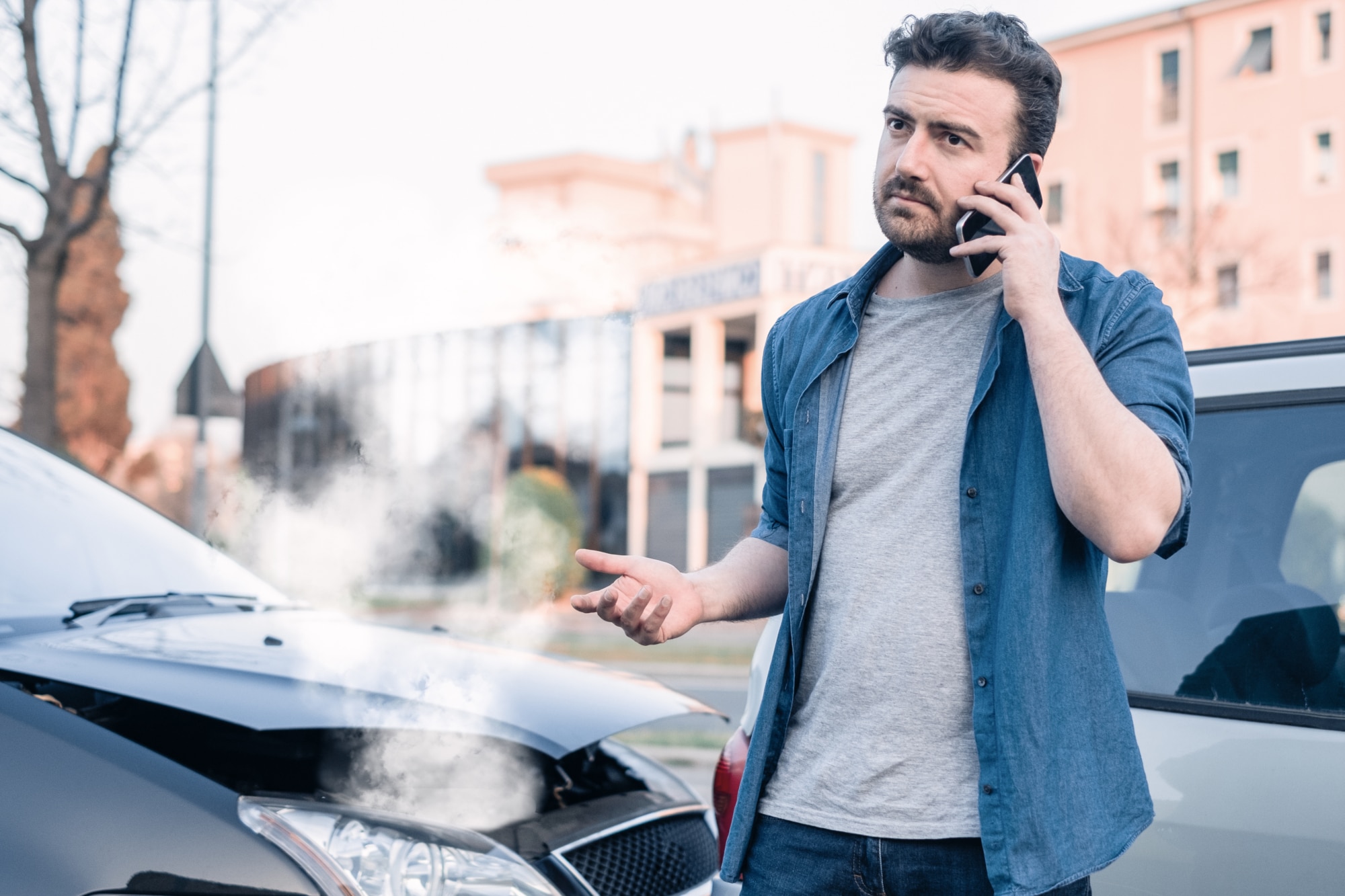 a man calling a car accident lawyer after an accident in Bangor, ME