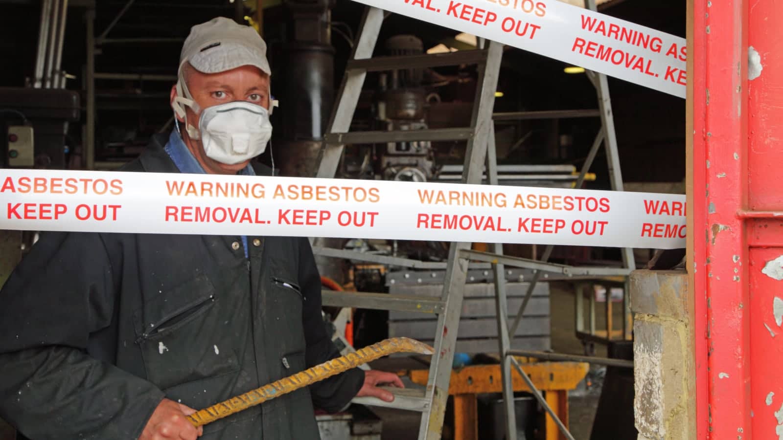 Man Removing Asbestos Stock Photo