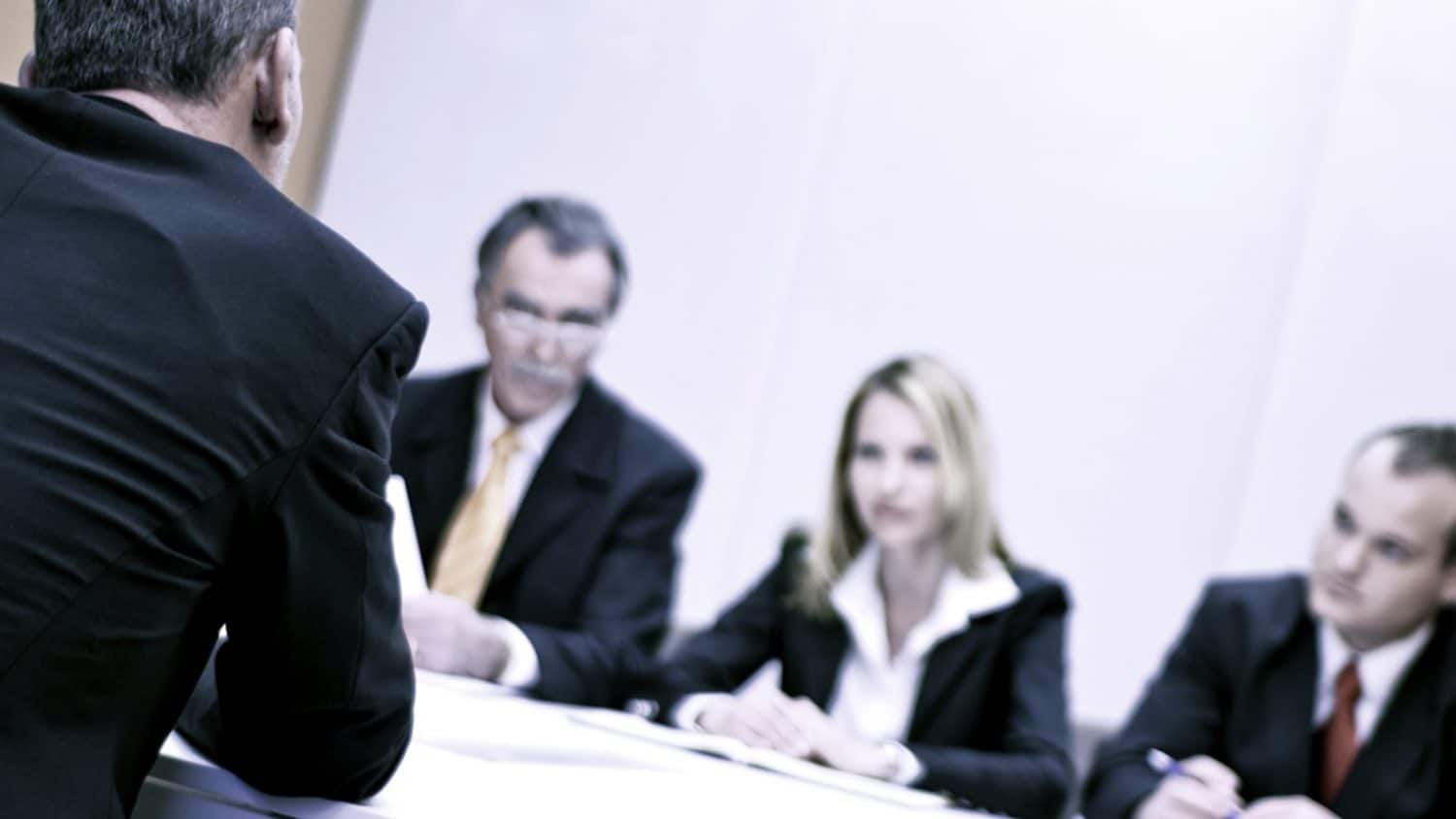 Lawyers Mediating In A Conference Room Stock Photo