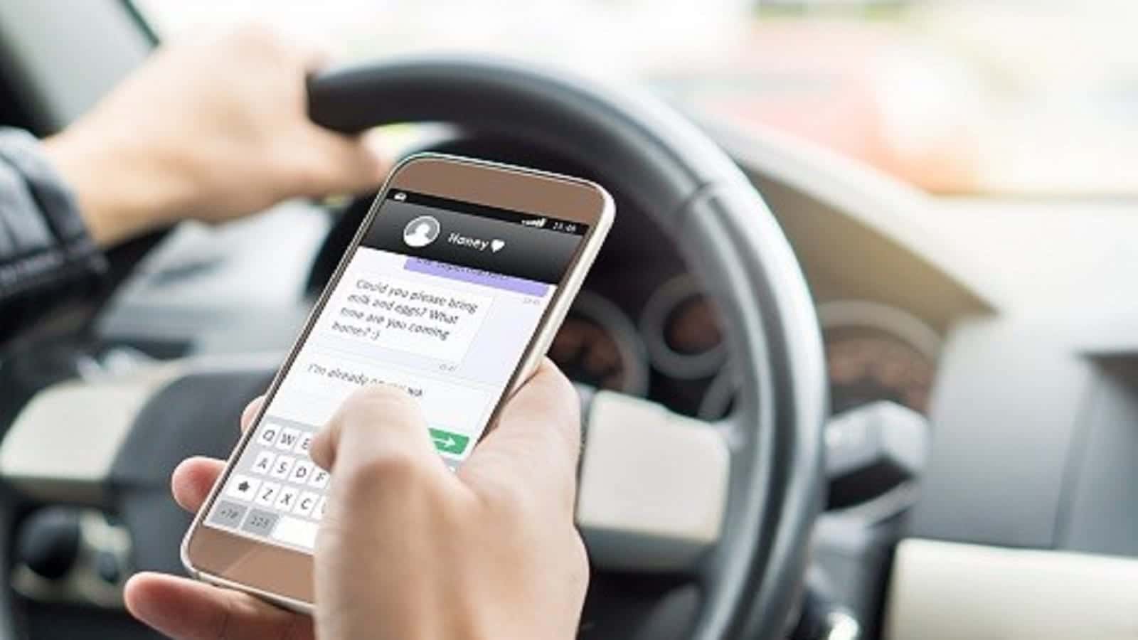 Texting and Driving Stock Photo